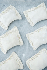 Raw dough with filling. Chicken pie. Dough preparation. Cooking process 