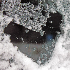 heart of snow on the glass. sleet on glass