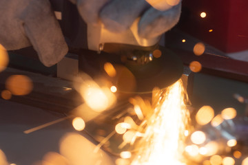 Glowing flow of steel or metal grinding