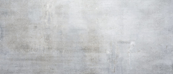 Texture of a old gray concrete wall with cracks as a background or wallpaper