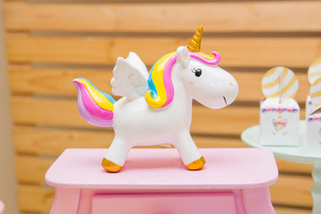 porcelain unicorn used for children's party decoration © BrunoMartinsImagens