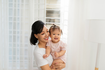 Happy Mother and daughter hugging