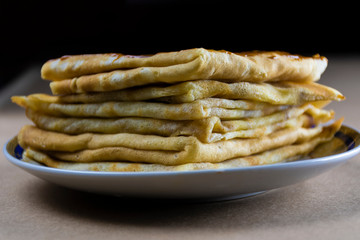 Homemade pancakes, milk pancakes on a plate.