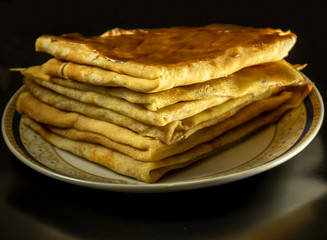 Homemade pancakes, milk pancakes on a plate.