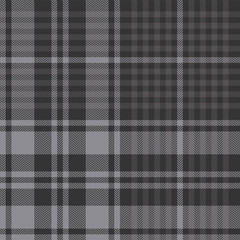 Plaid pattern background. Seamless herringbone woven pixel check plaid tartan graphic in dark grey for blanket, throw, duvet cover, or other modern autumn or winter fabric design.