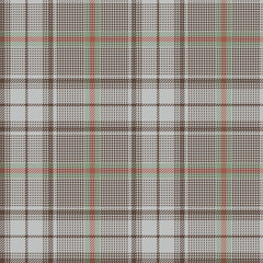 Plaid pattern seamless tartan background in dark brown, grey, coral, and green. Glen abstract check plaid for jacket, coat, skirt, or other spring, autumn, winter tweed fashion textile design.