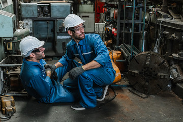 Engineer men wearing uniform accident on floor from work and saviour. health and safety concept.