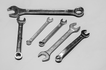 Set of spanners on white background