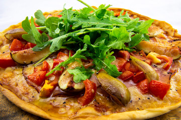 Pizza with figs, prosciutto and mozzarella