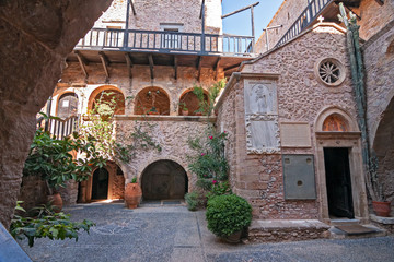 View of the inner courtyard of the monastery of Toplou in Crete in Gracia.
