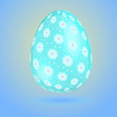 blue Easter egg with elements of flowers and circles