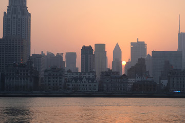 sunset of The Bund in Shanghai by the side of Huangpu River.