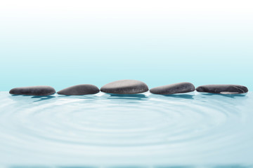 zen stone on the water with copy space for your text