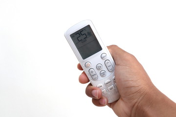 Air conditioner remote in hand  white background