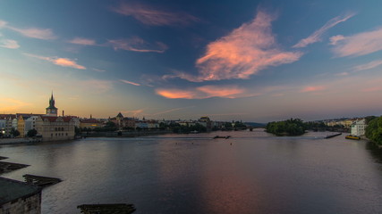 View from Charles Bridge in Prague before the sunrise night to day timelapse, Bohemia, Czech Republic.