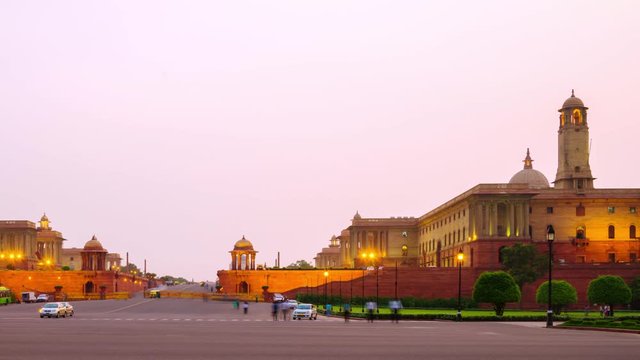 Delhi, India. Illuminated Rashtrapati Bhavan an Parliament building in Delhi, India. Time-lapse of car traffic trail lights
