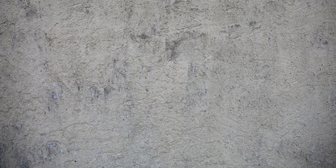 concrete wall pattern wide texture background with traces of blows past life