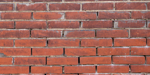 Old red grunge brick masonry wall Background