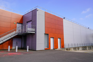 exterior of  building company headquarters with a warehouse commercial office