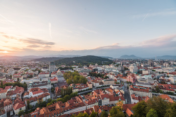 Fototapeta premium Aerial view of the sunset cityscape in Ljubljana, Slovenia