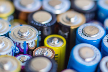  Macro of spent colored batteries.  Recycling process concept.