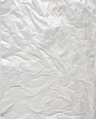 white sheet of paper battered with texture