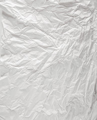 white sheet of paper battered with texture