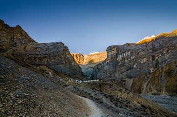 Thorung Phedi in autumn sunny evening. Annapurna circuit trek, Nepal.
