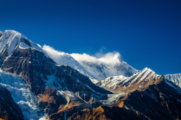 Mt. Khangsar Kang and Gangapurna slope, view from Kicho Tal (Ice lake). Annapurna circuit trek, Nepal.