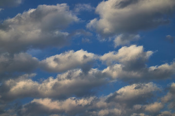 Beautiful, spring clouds in the blue sky, which portend the change of weather.