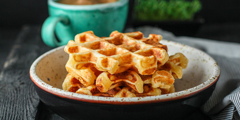 Belgian waffles (delicious sweet dish, dessert snack) menu concept. background. top view. copy space