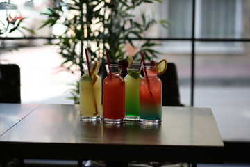 colorful fruit cocktails on table