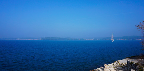 Adriatic sea with board and coast in Rovinj, Croatia