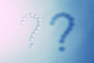 Question mark. Abstract banner with a question mark. Question mark made of drops.