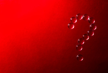 Question mark. Abstract banner with a question mark. Question mark made of drops.