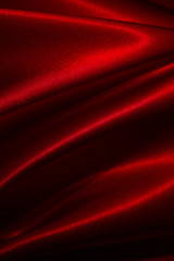 Obraz premium Beautiful satin drapery. Satin pink fabric. Abstract design.