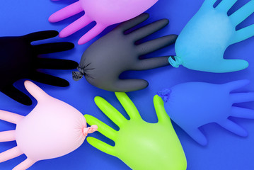 multi-colored medical gloves isolated. Sterile equipment for the medical and beauty industries. Copy space