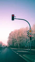 Afwasbaar Fotobehang Licht violet verkeerslichten in de stad