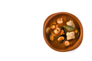 French bouillabaisse soup in bowl isolated on white back Top view. Copy spaceground.