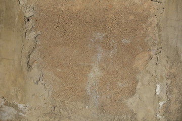 Cement wall with cracks in industrial building, surface for your design and texture background.