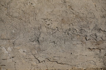 Cement wall with cracks in industrial building, surface for your design and texture background.