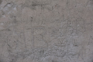 Cement wall with cracks in industrial building, surface for your design and texture background.