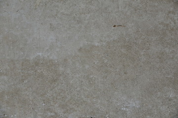 Cement wall with cracks in industrial building, surface for your design and texture background.