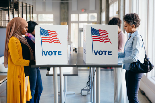 Diverse Women Voting on Election Day