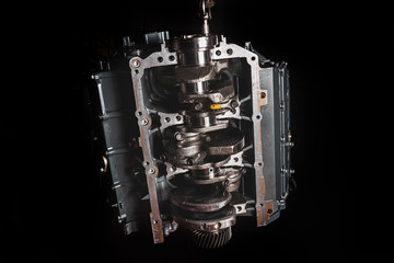 Still life car engine on black background
