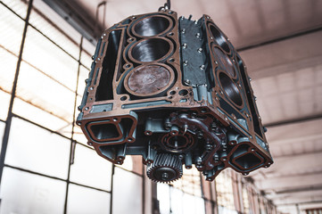 Still life car engine on black background