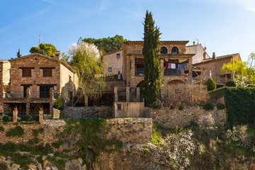 Fototapeta na wymiar View of the tall houses of the historic center of Mura, Catalonia, Spain