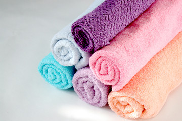 Obraz na płótnie Canvas Towels in delicate colors. Natural cotton. Home textiles.
