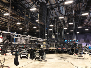 Installation of professional sound, light, video and stage equipment for a concert. Lifting of line...