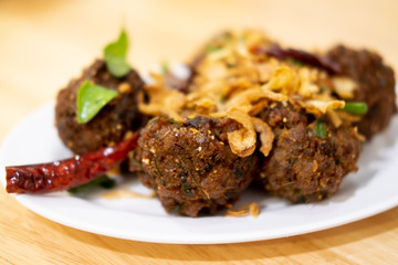 Deep fried spicy minced pork Thai name is Lab Moo Tod